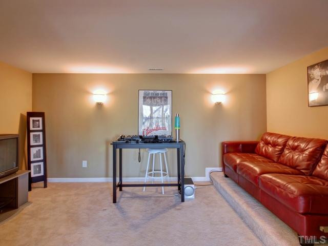 7807 Snow Heights Lane Raleigh, NC 27613 - Photo 19 of 21 Media room in basement.