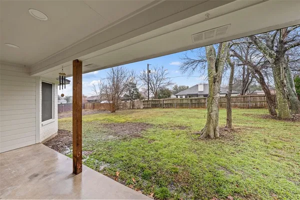 a view of a garden with a slide