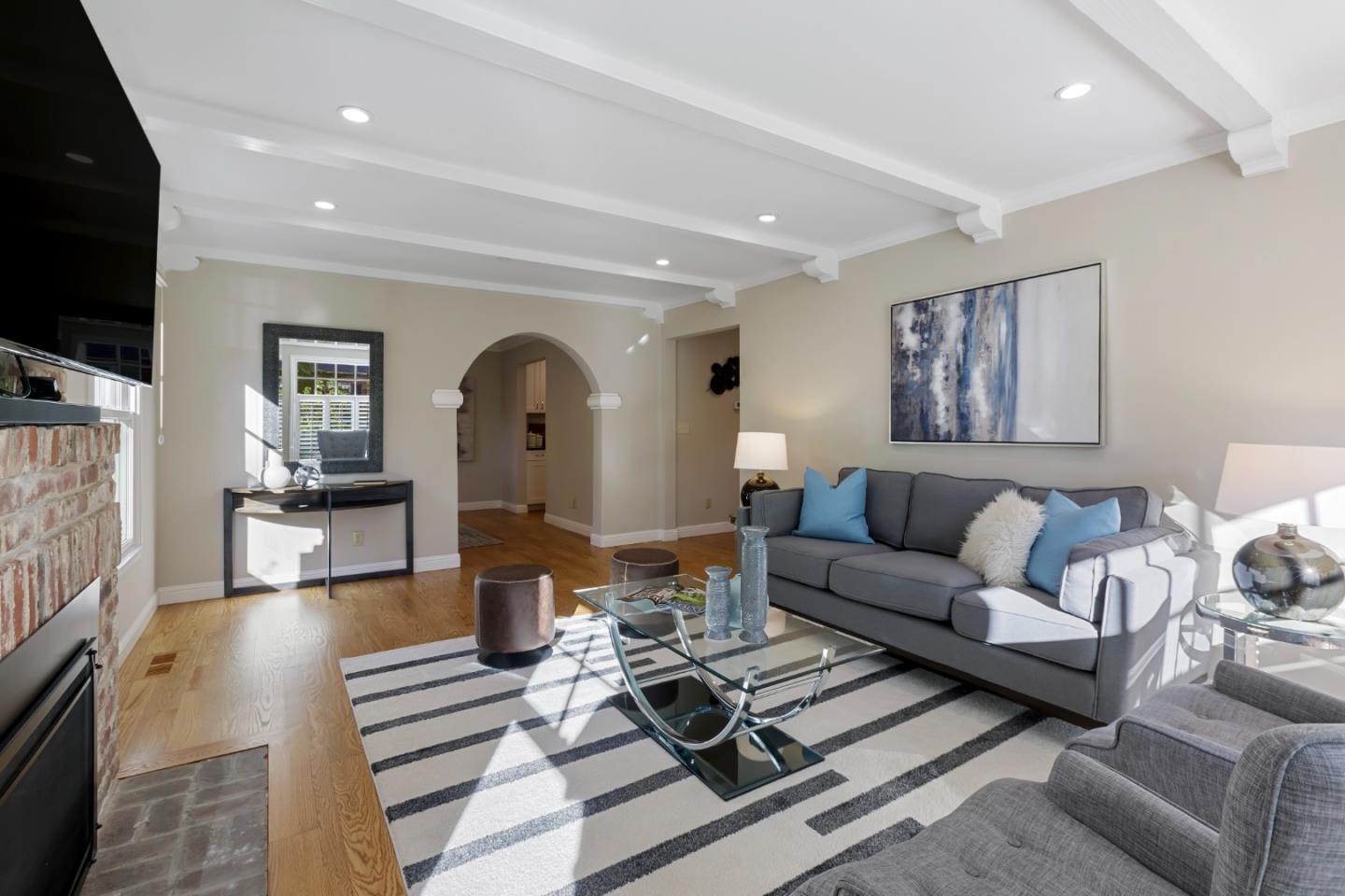 1001 Harvard Road San Mateo, CA 94402 - Photo 11 of 54 a living room with furniture and a flat screen tv