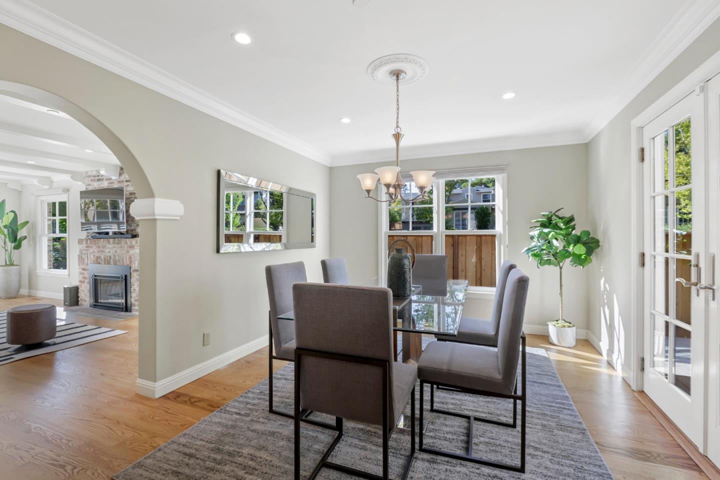 1001 Harvard Road San Mateo, CA 94402 - Photo 13 of 54 a view of a dining room with furniture window and wooden floor