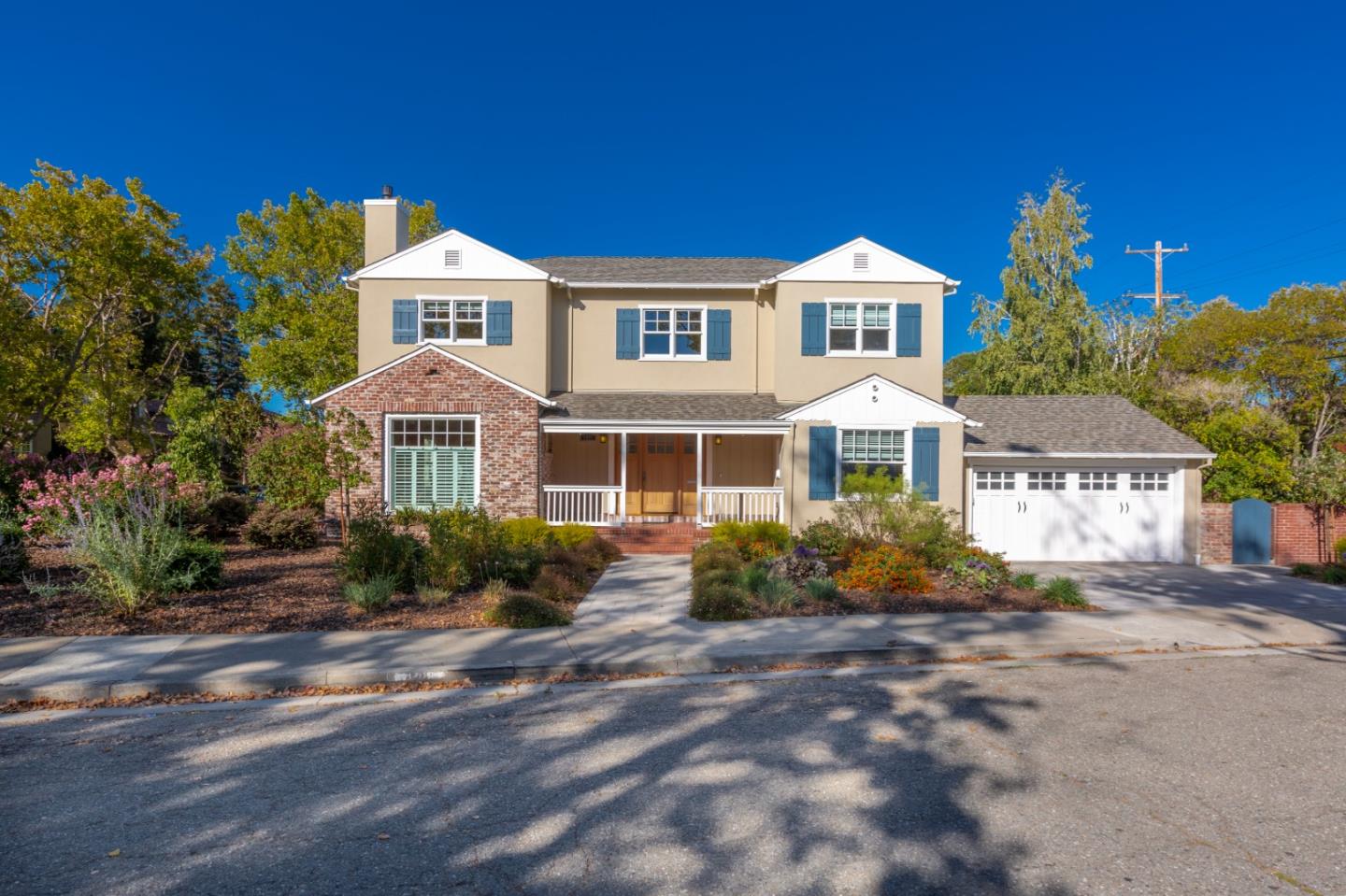 1001 Harvard Road San Mateo, CA 94402 - Photo 2 of 54 a front view of a house with a yard