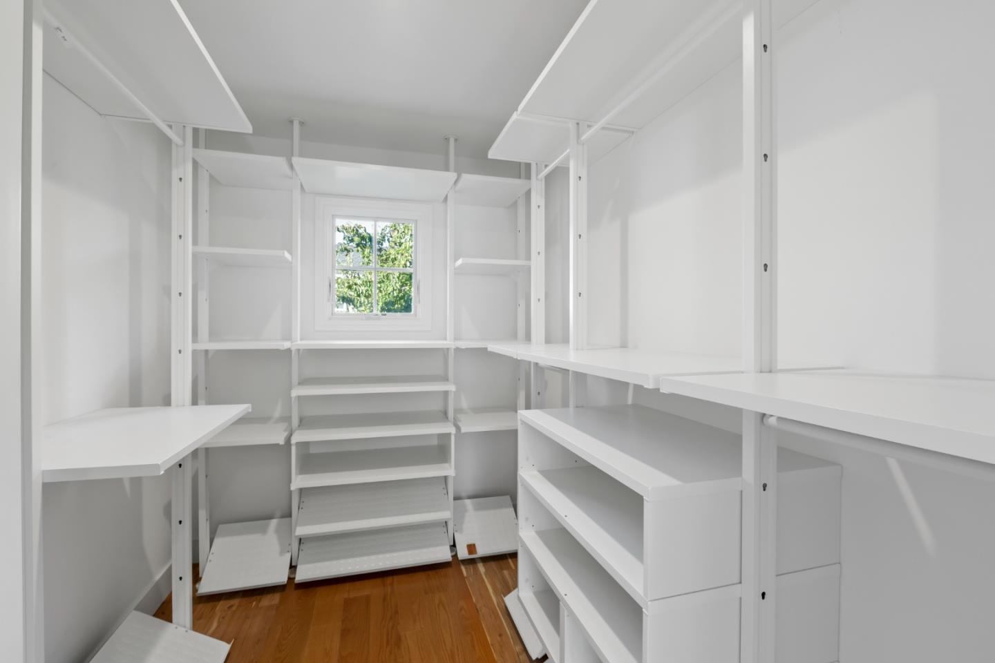 1001 Harvard Road San Mateo, CA 94402 - Photo 29 of 54 a view of walk in closet with empty racks