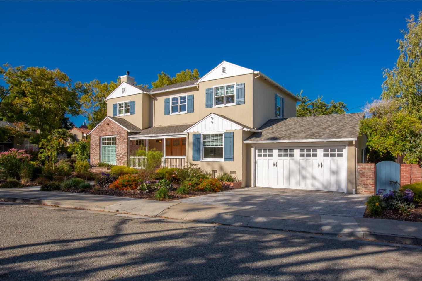 1001 Harvard Road San Mateo, CA 94402 - Photo 3 of 54 a front view of a house with a yard