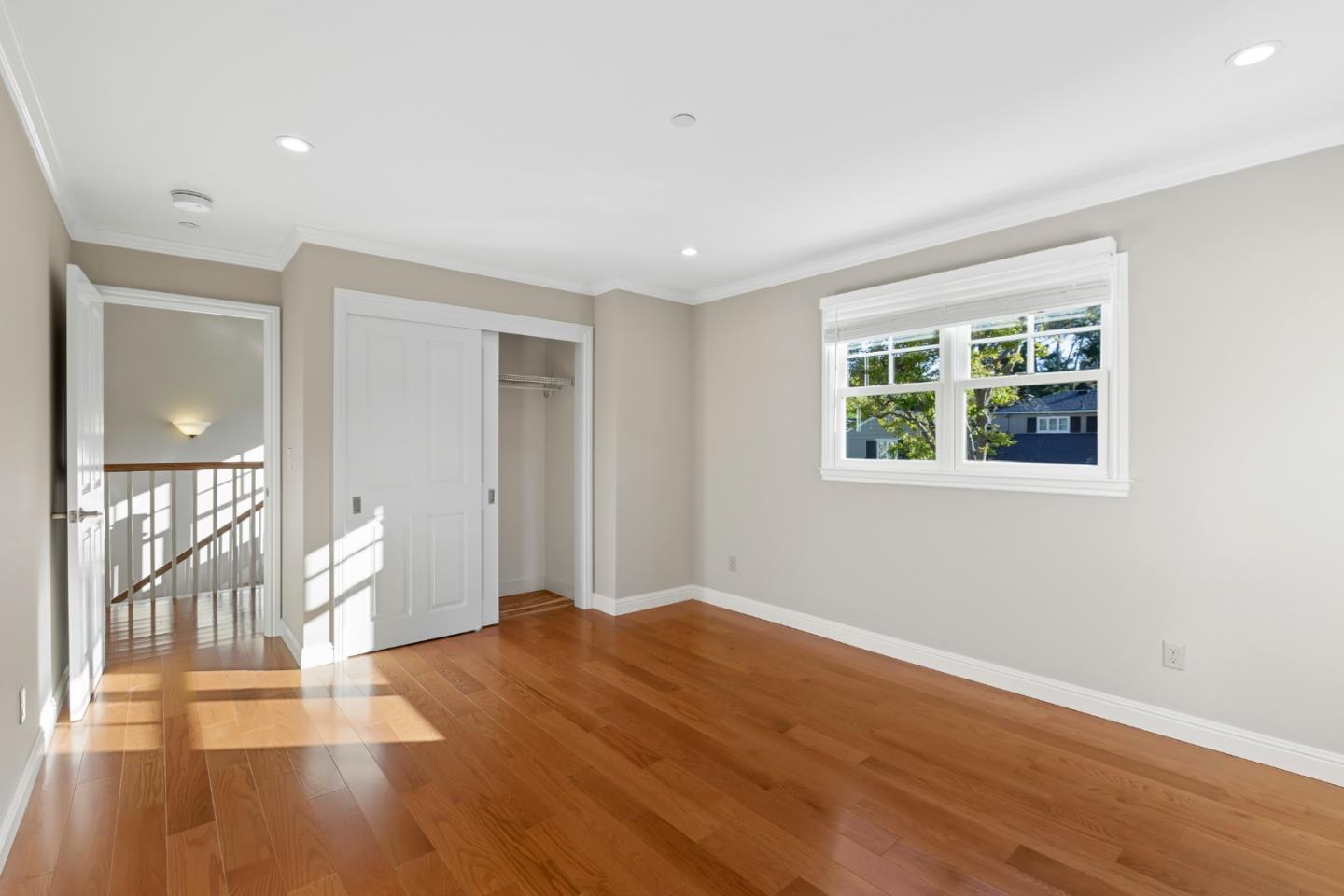 1001 Harvard Road San Mateo, CA 94402 - Photo 37 of 54 a view of empty room with wooden floor and fan