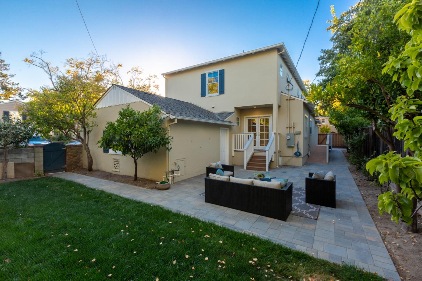 1001 Harvard Road San Mateo, CA 94402 - Photo 39 of 54 a front view of a house with a garden and a tree