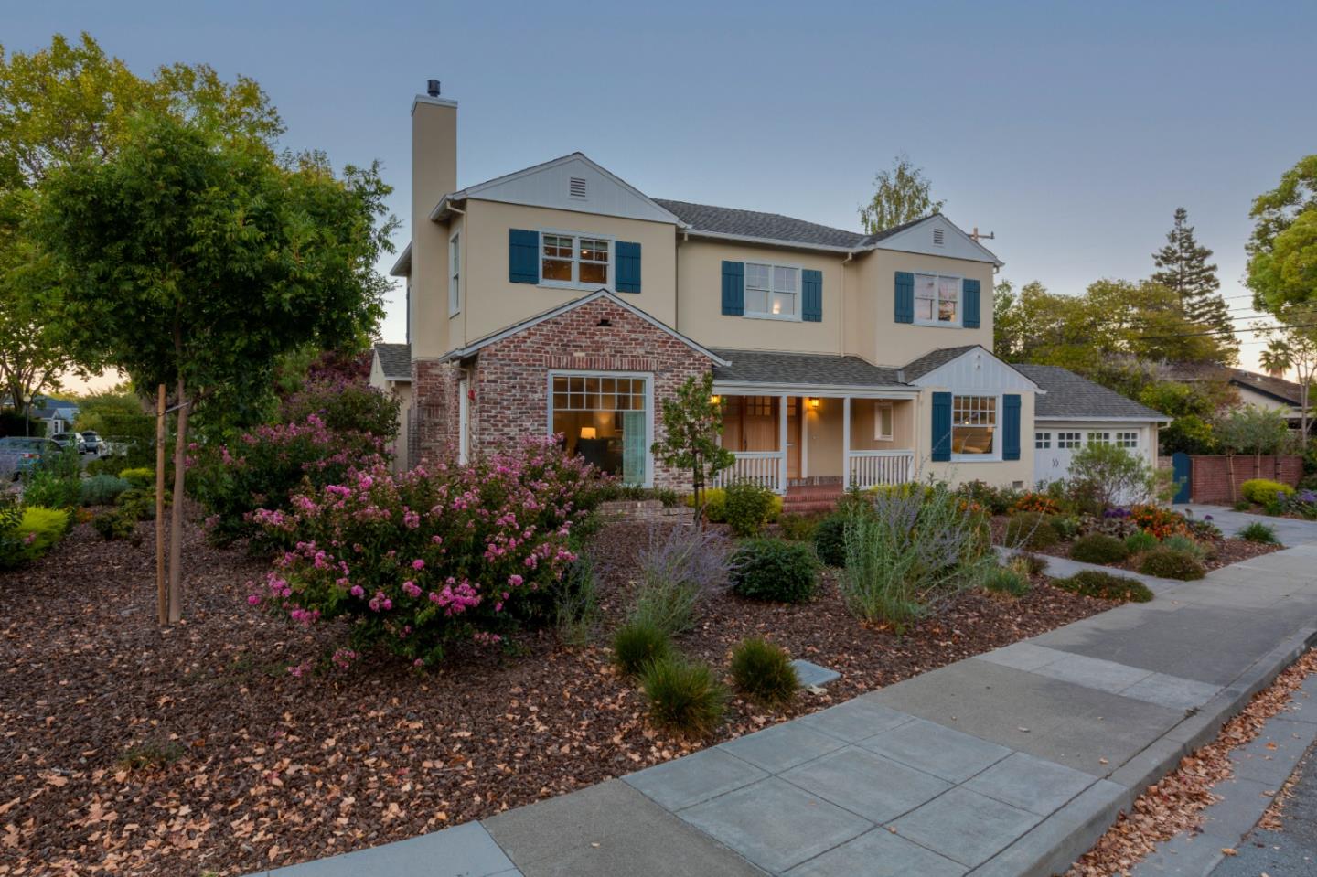 1001 Harvard Road San Mateo, CA 94402 - Photo 4 of 54 a front view of a house with a yard