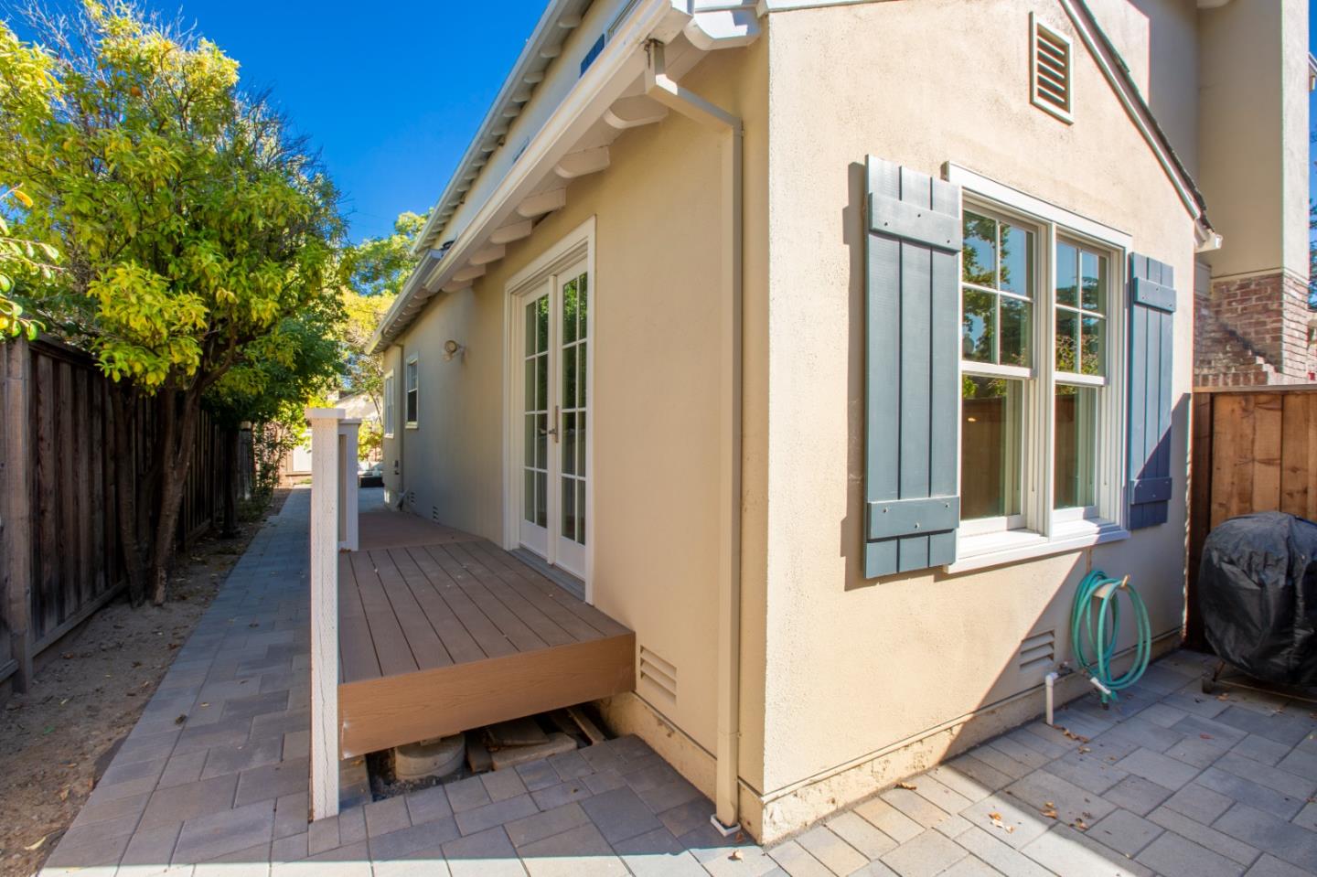 1001 Harvard Road San Mateo, CA 94402 - Photo 43 of 54 a view of a house with backyard and wooden floor
