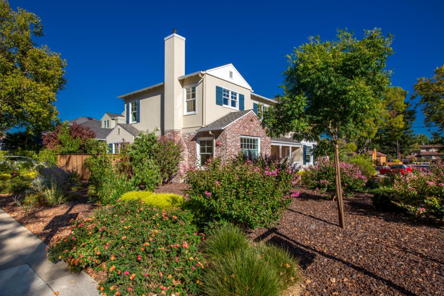 1001 Harvard Road San Mateo, CA 94402 - Photo 45 of 54 a front view of a house with a yard