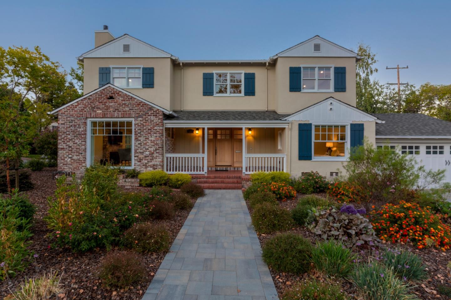 1001 Harvard Road San Mateo, CA 94402 - Photo 47 of 54 a front view of a house with a yard and garage