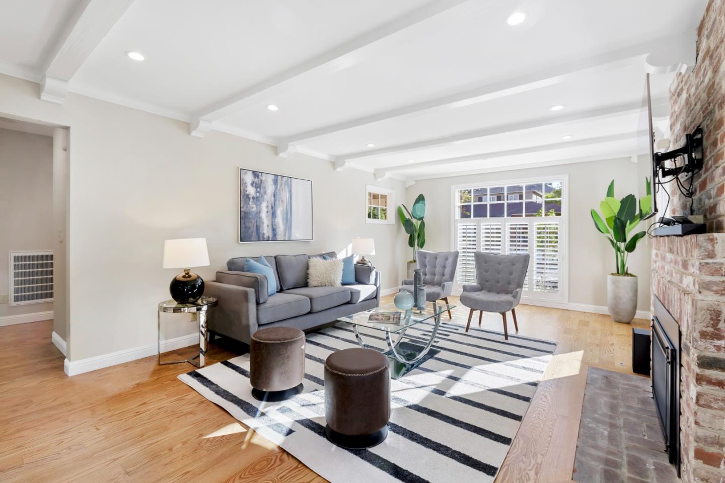 1001 Harvard Road San Mateo, CA 94402 - Photo 10 of 54 a living room with furniture and a wooden floor