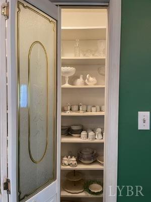 5185 Wards Road Evington, VA 24550 - Photo 22 of 26 a view of a bathroom with rack on the wall and a window