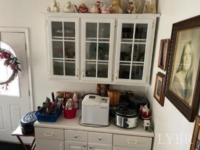 5185 Wards Road Evington, VA 24550 - Photo 25 of 26 a kitchen with a window and potted plant