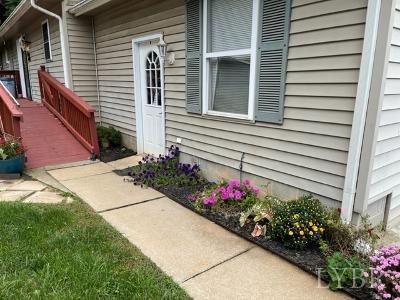 5185 Wards Road Evington, VA 24550 - Photo 8 of 26 a view of a house with potted plants