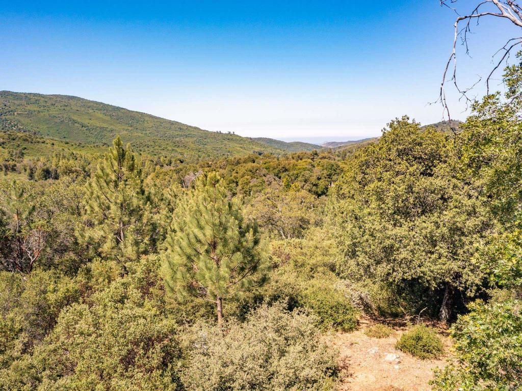 7 West Incense Cedar Road Julian, CA 92036 - Photo 19 of 24 a view of a large mountain with mountains in the background