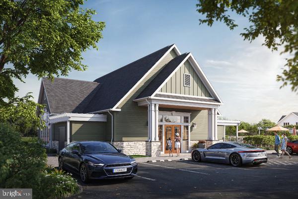 24591 Inkberry Drive Harbeson, DE 19951 - Photo 11 of 11 a front view of a house with car parked