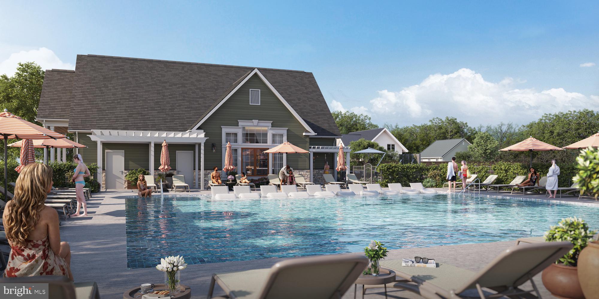 24591 Inkberry Drive Harbeson, DE 19951 - Photo 9 of 11 a front view of house with yard and seating area