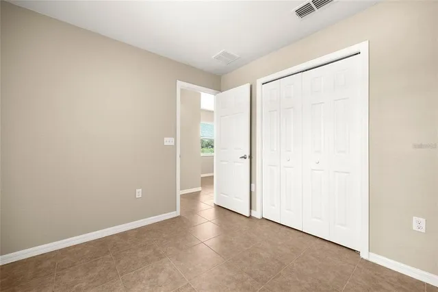 an empty room with a natural light