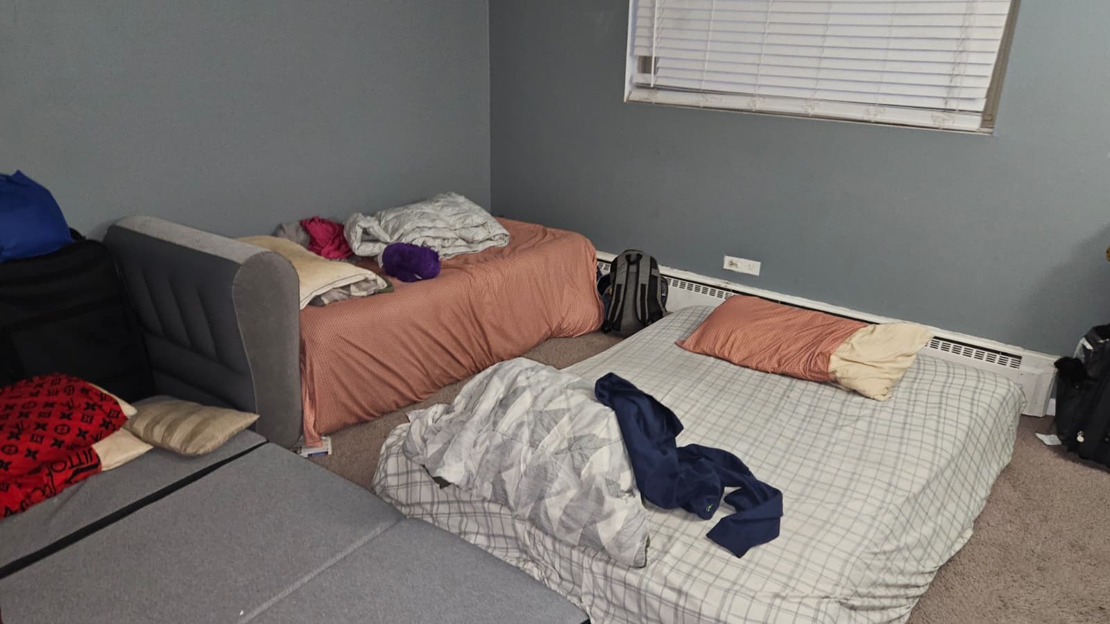 18550 Torrence Avenue, Unit 5 Lansing, IL 60438 - Photo 7 of 12 a bedroom with two bed and a window