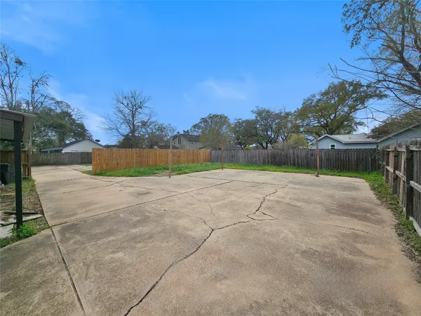 a view of backyard with green space