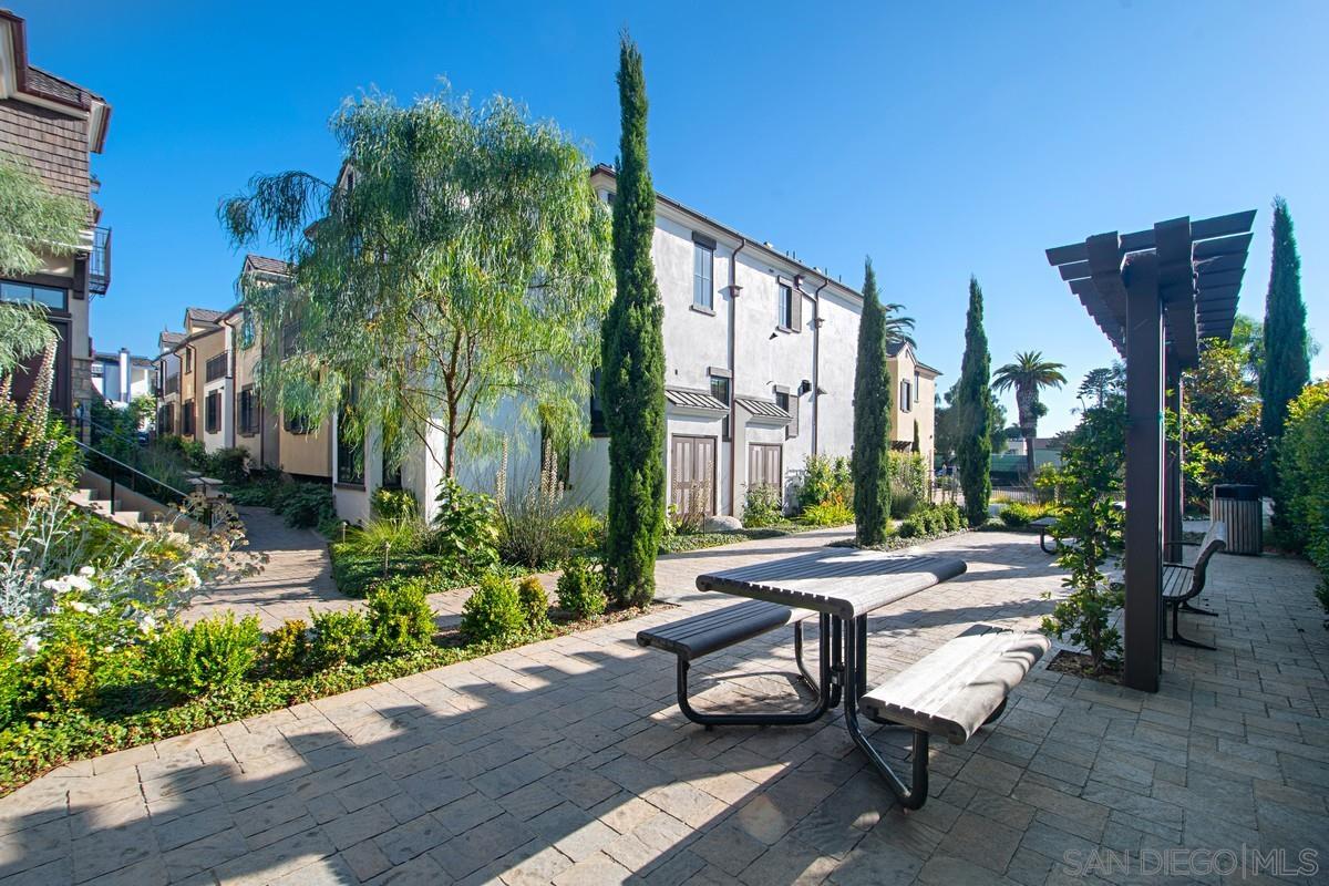 712 Silver Street La Jolla, CA 92037 - Photo 18 of 21 a building outdoor space with patio furniture and potted plants