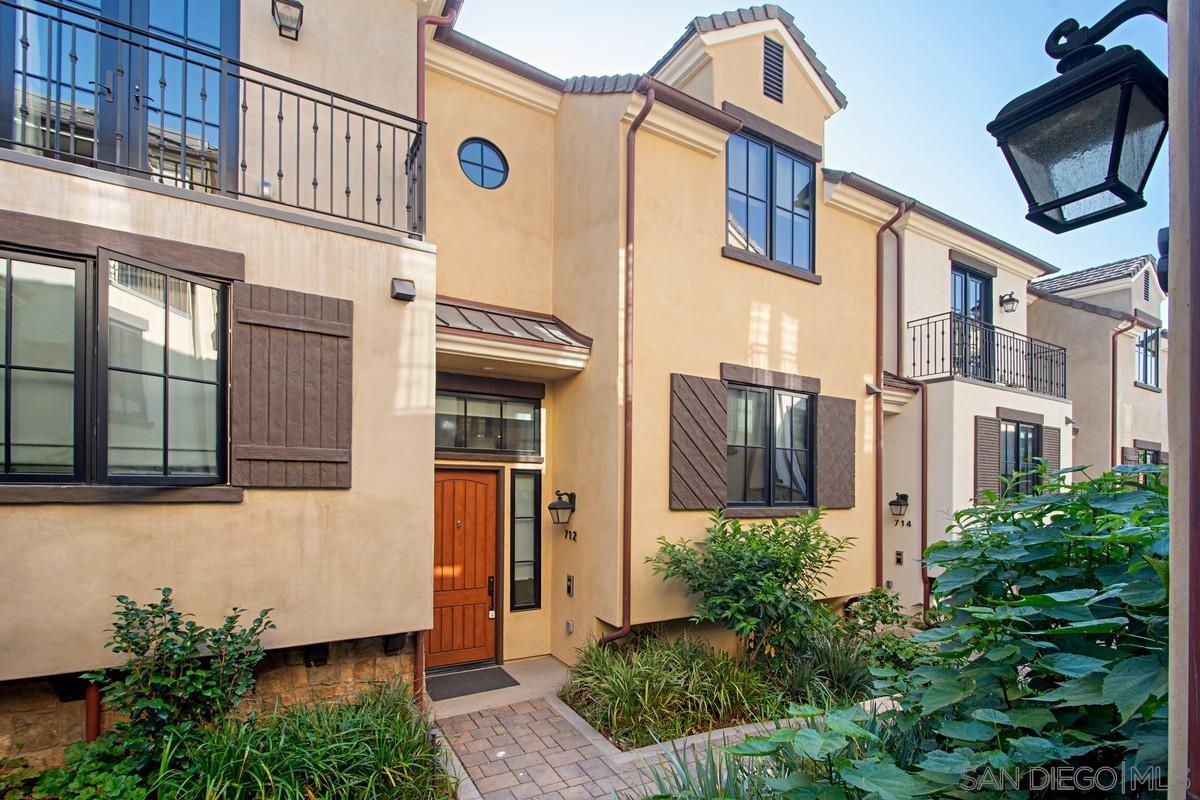 712 Silver Street La Jolla, CA 92037 - Photo 2 of 21 a view of a brick house with many windows