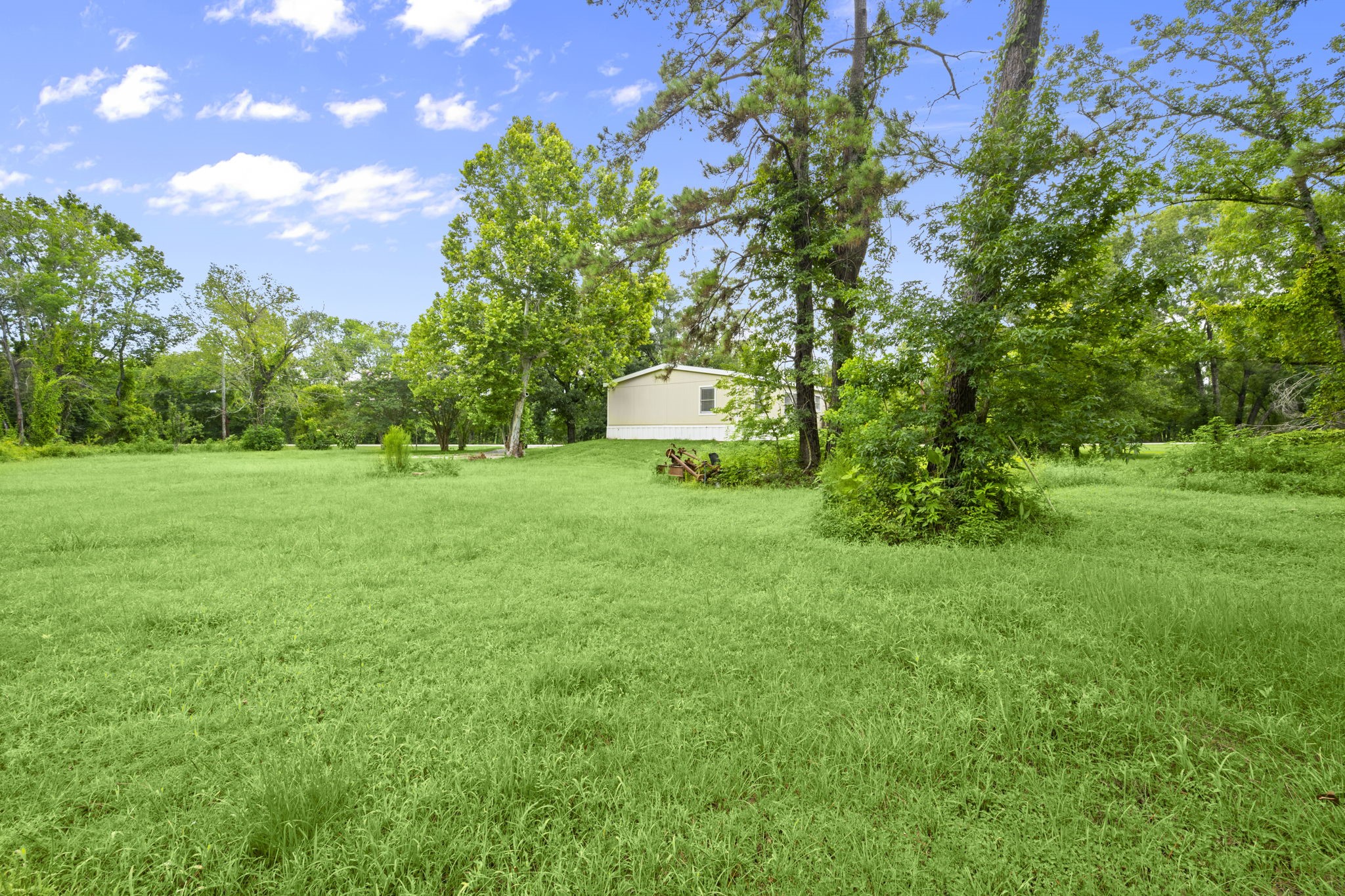 285 County Road 388 Cleveland, TX 77328 - Photo 18 of 23 a view of a volley ball court