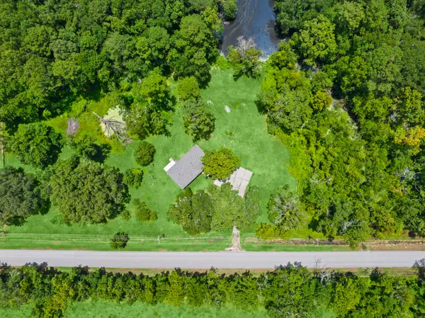 a view of a lush green field