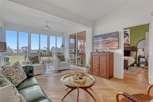 a living room with furniture and a table