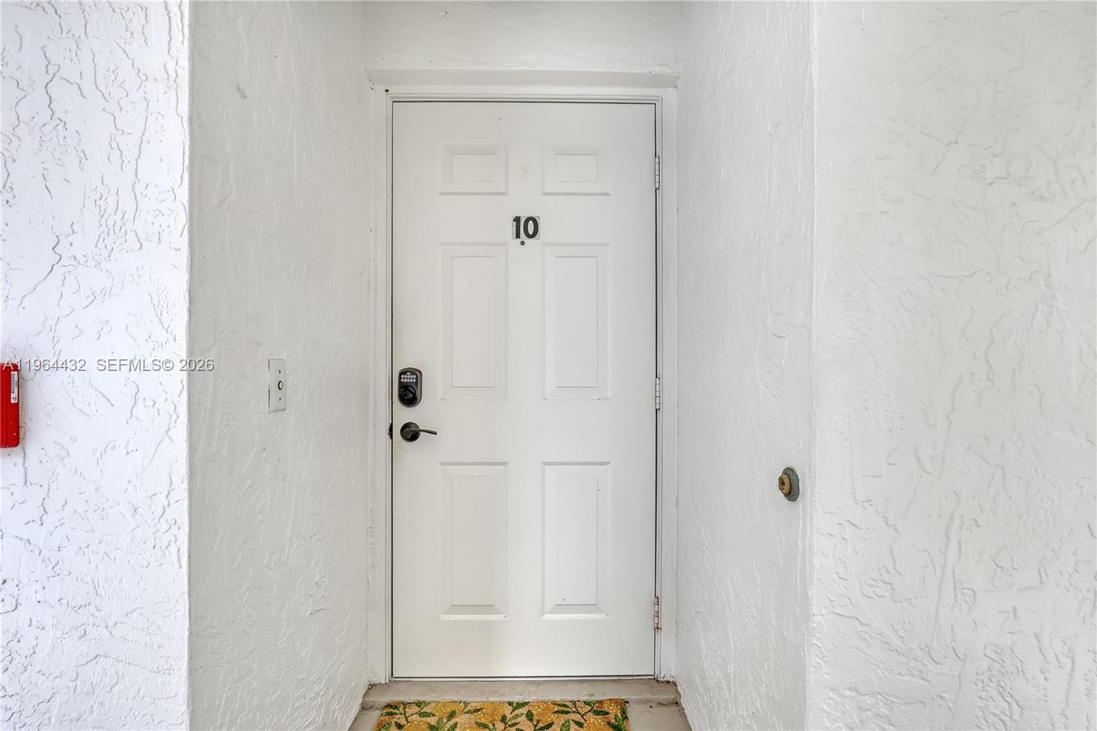 6062 Southeast Landing Way, Unit 10 Stuart, FL 34997 - Photo 5 of 37 a bathroom with a granite countertop shower