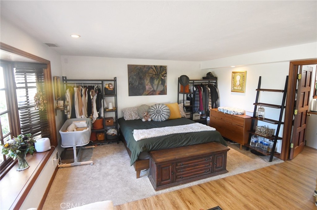 5621 Alwick Place Brea, CA 92821 - Photo 25 of 43 a living room with furniture and a wooden floor