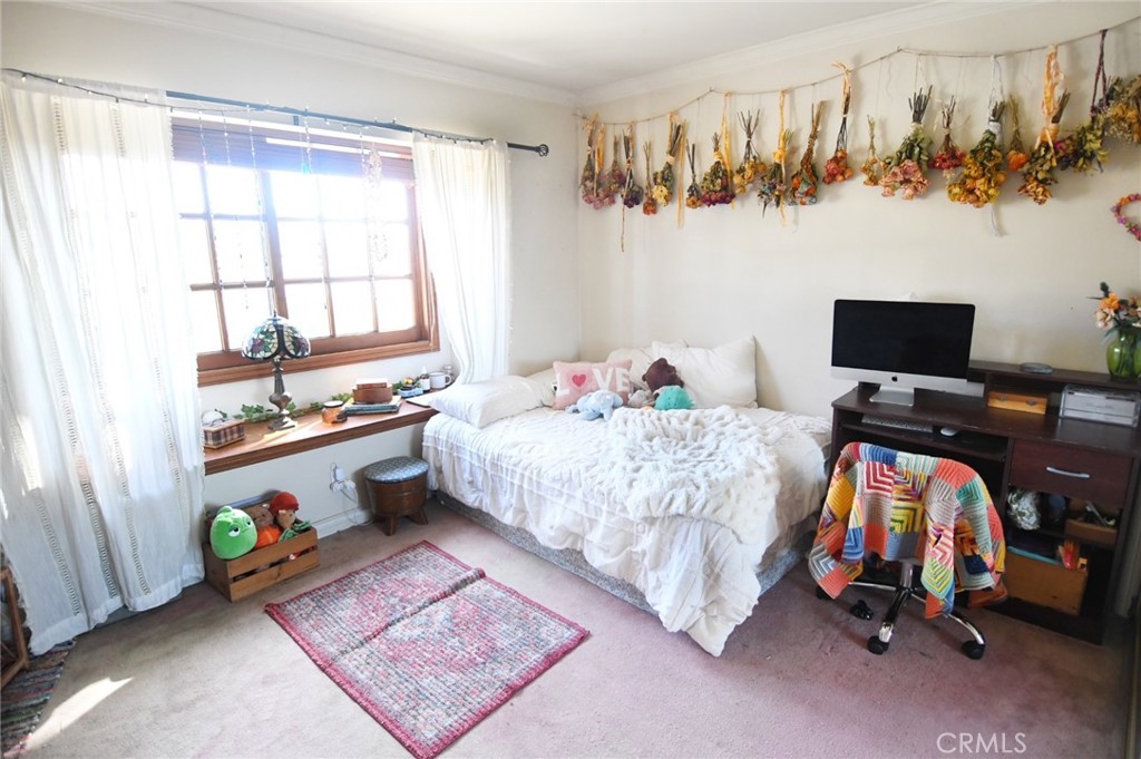 5621 Alwick Place Brea, CA 92821 - Photo 29 of 43 a bedroom with a bed and a window