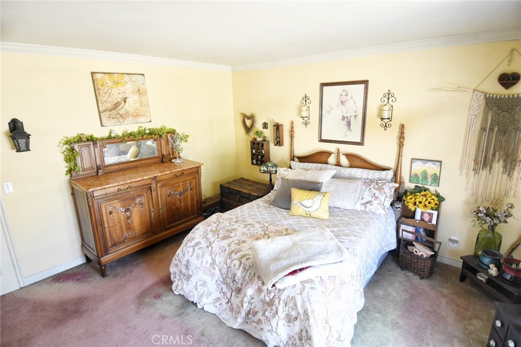 5621 Alwick Place Brea, CA 92821 - Photo 35 of 43 a bed room with a bed and a table