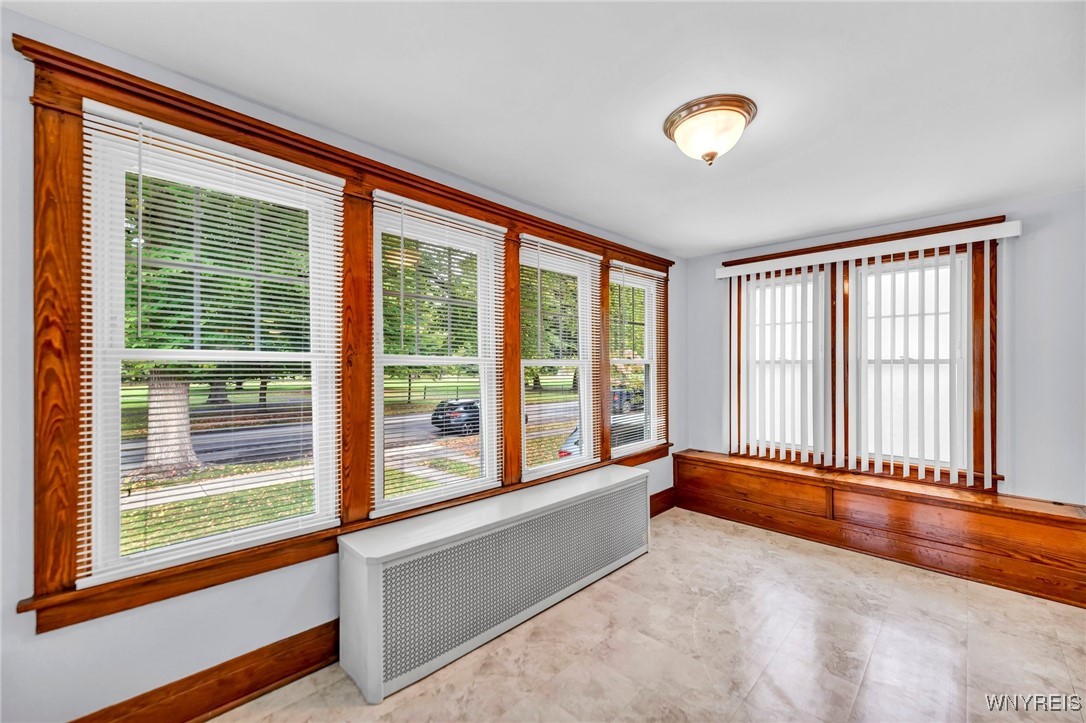 103 Potters Road Buffalo, NY 14220 - Photo 15 of 49 heated sunroom