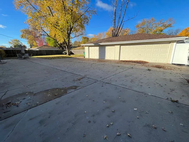 a view of a house with a street