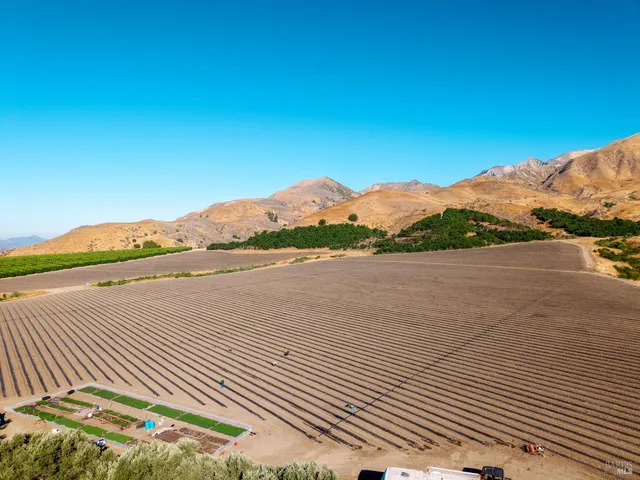 a view of a lake with mountains in the background