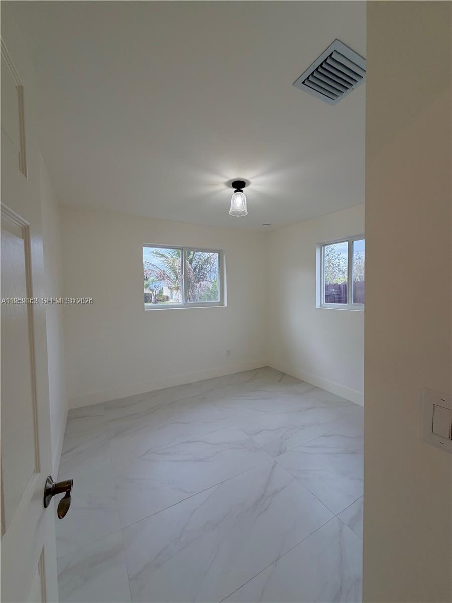 19221 Southwest 92nd Road Cutler Bay, FL 33157 - Photo 18 of 30 a view of an empty room
