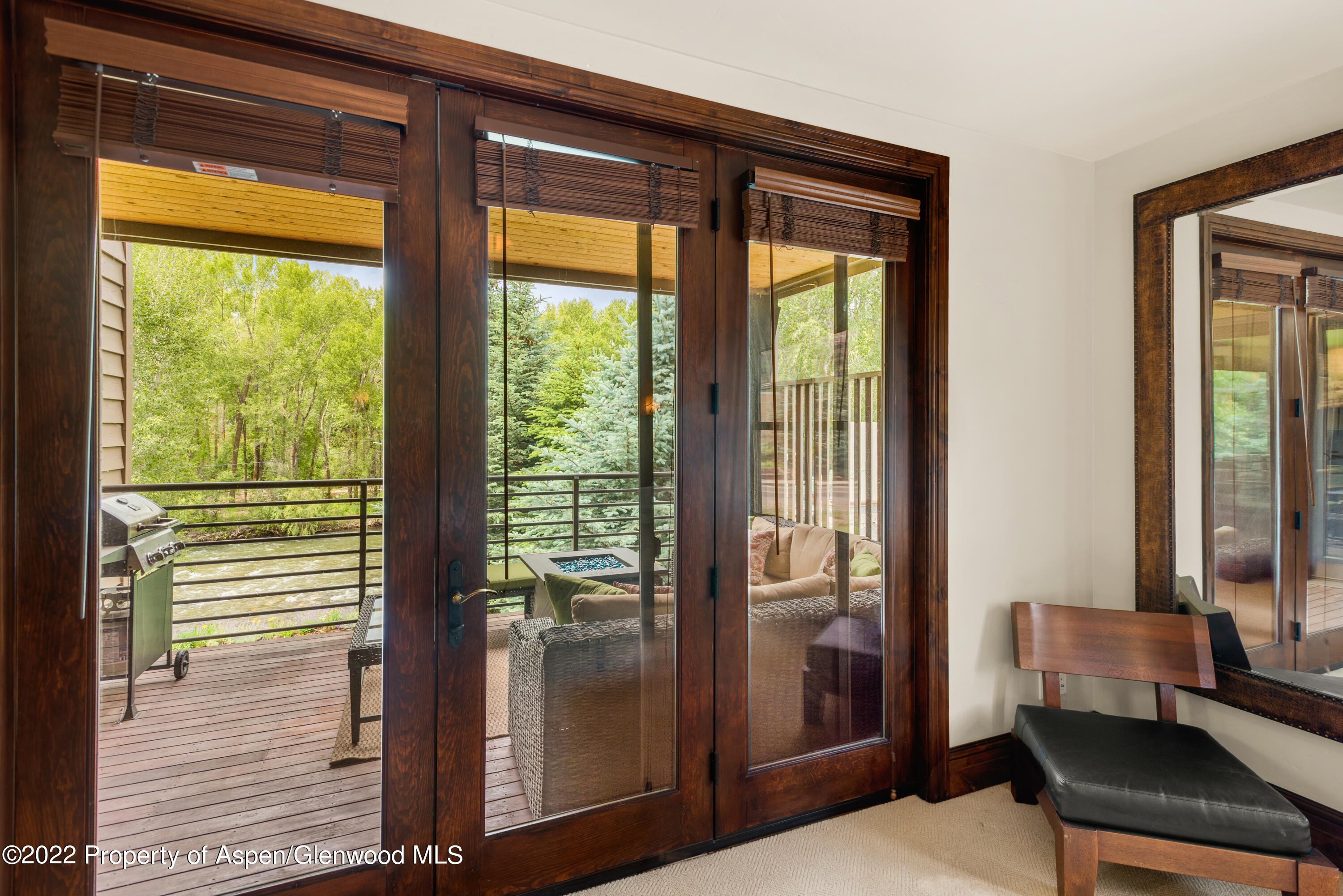 23272 2 Rivers Road, Unit 201 Basalt, CO 81621 - Photo 16 of 25 a view of a room that has a bed and a window