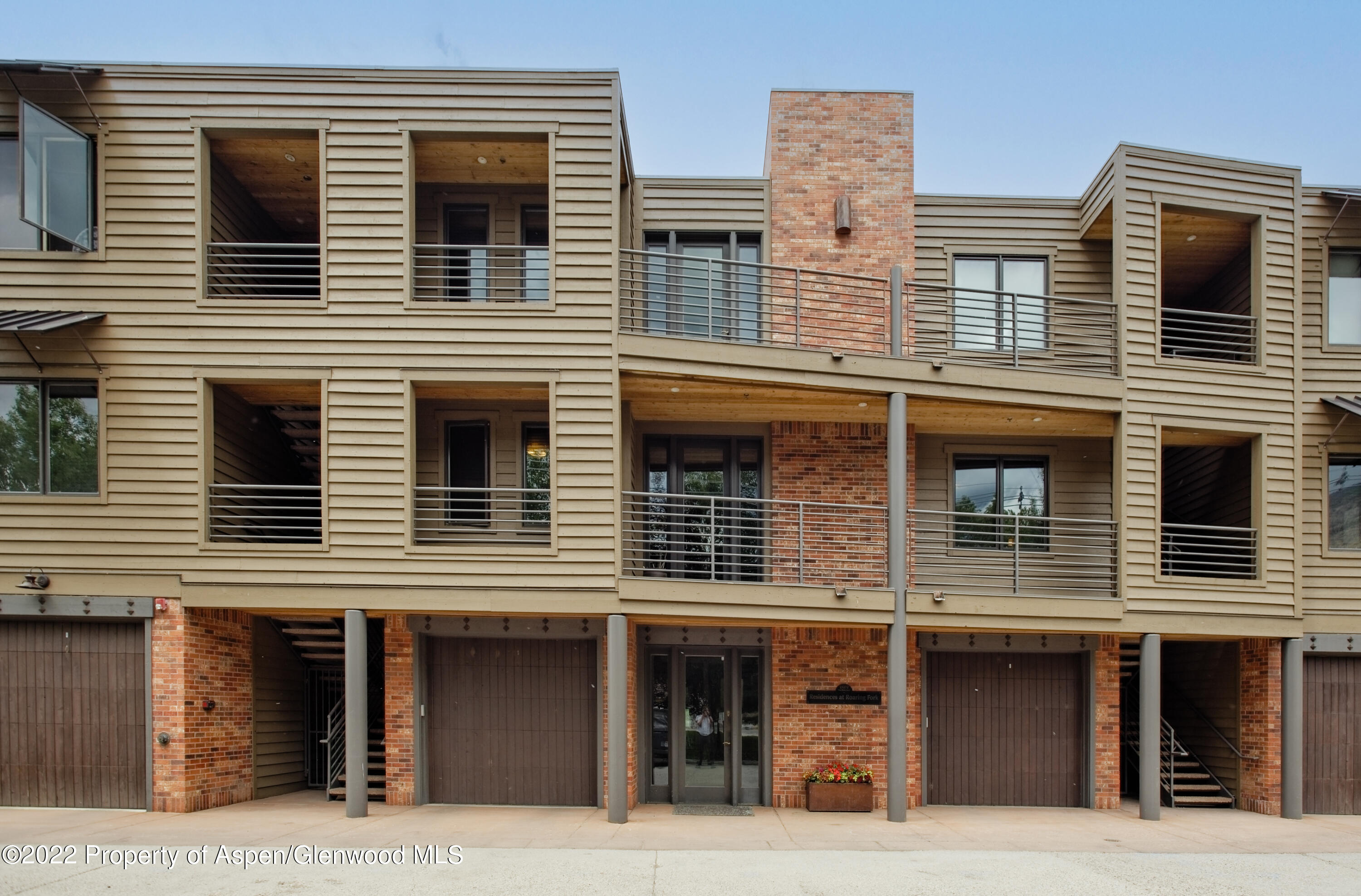 23272 2 Rivers Road, Unit 201 Basalt, CO 81621 - Photo 24 of 25 a building that has lots of windows