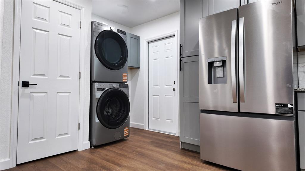 2607 Northeast 140th Street Citra, FL 32113 - Photo 14 of 36 a utility room with washer and dryer