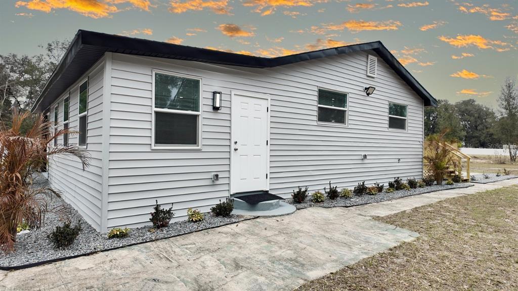 2607 Northeast 140th Street Citra, FL 32113 - Photo 29 of 36 a front view of a house