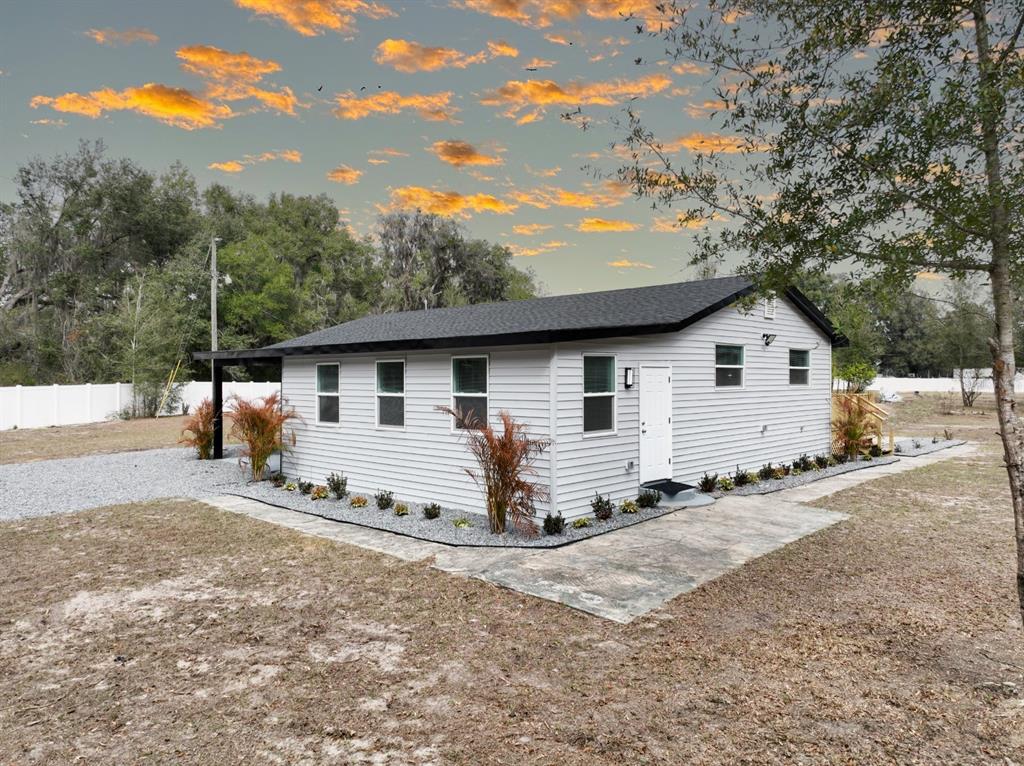 2607 Northeast 140th Street Citra, FL 32113 - Photo 33 of 36 a view of a house with backyard
