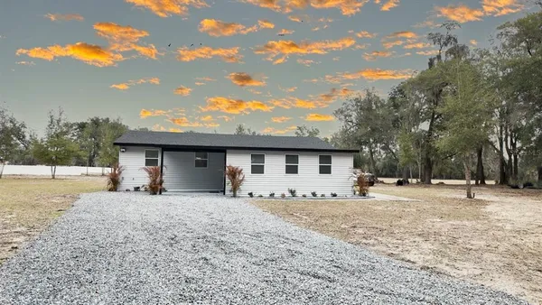 a house view with a outdoor space