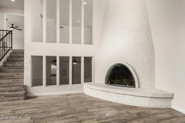 a view of a fireplace and a window