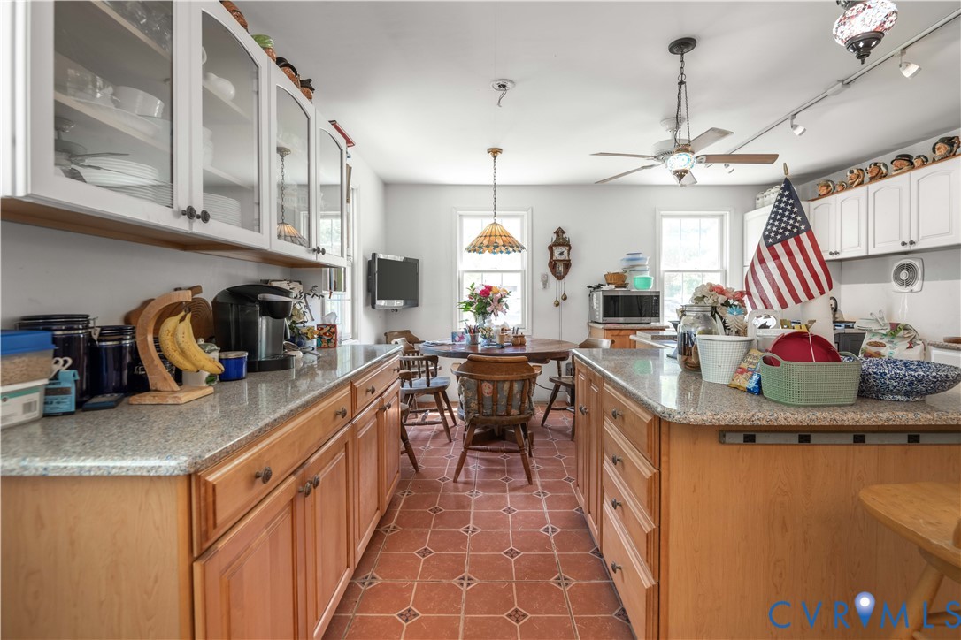 6243 Studley Road Mechanicsville, VA 23116 - Photo 27 of 65 a kitchen with stainless steel appliances granite countertop a sink stove and cabinets