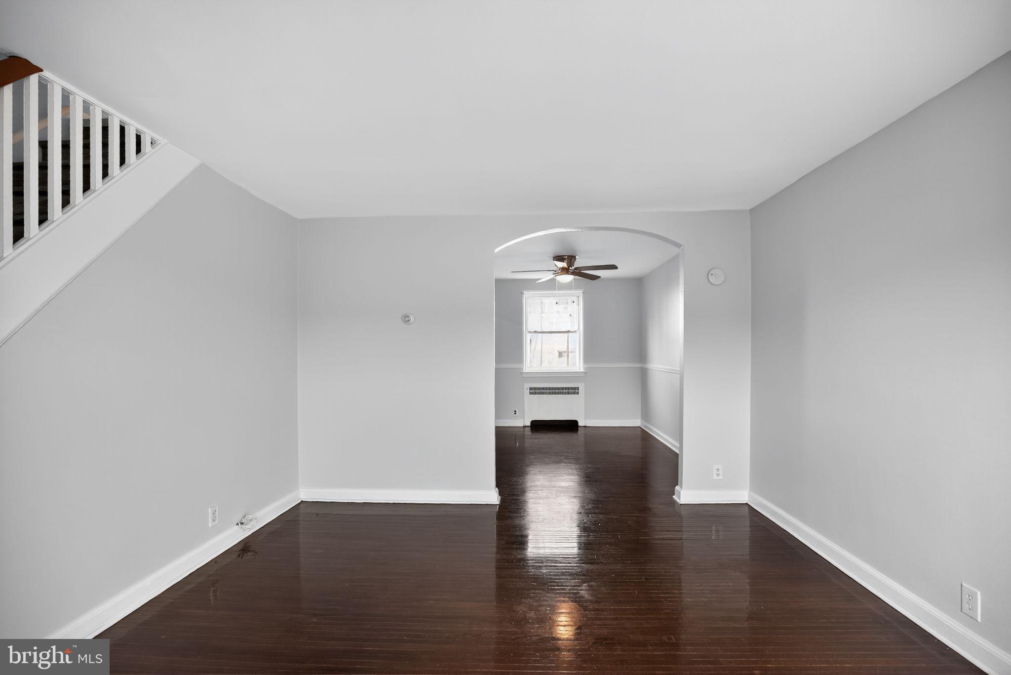 558 Snowden Road Upper Darby, PA 19082 - Photo 14 of 30 a view of an empty room with wooden floor