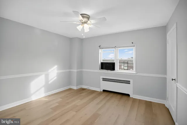 a view of livingroom with furniture wooden floor and window