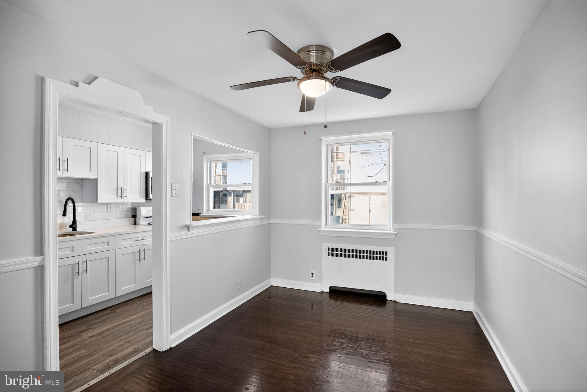558 Snowden Road Upper Darby, PA 19082 - Photo 21 of 30 a view of a kitchen and an empty room