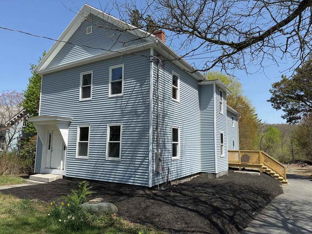 32 Main Street Monson, MA 01057 - Photo 2 of 42 a view of a house with a yard