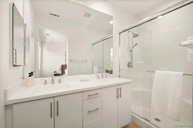 a view of a house with a potted plant