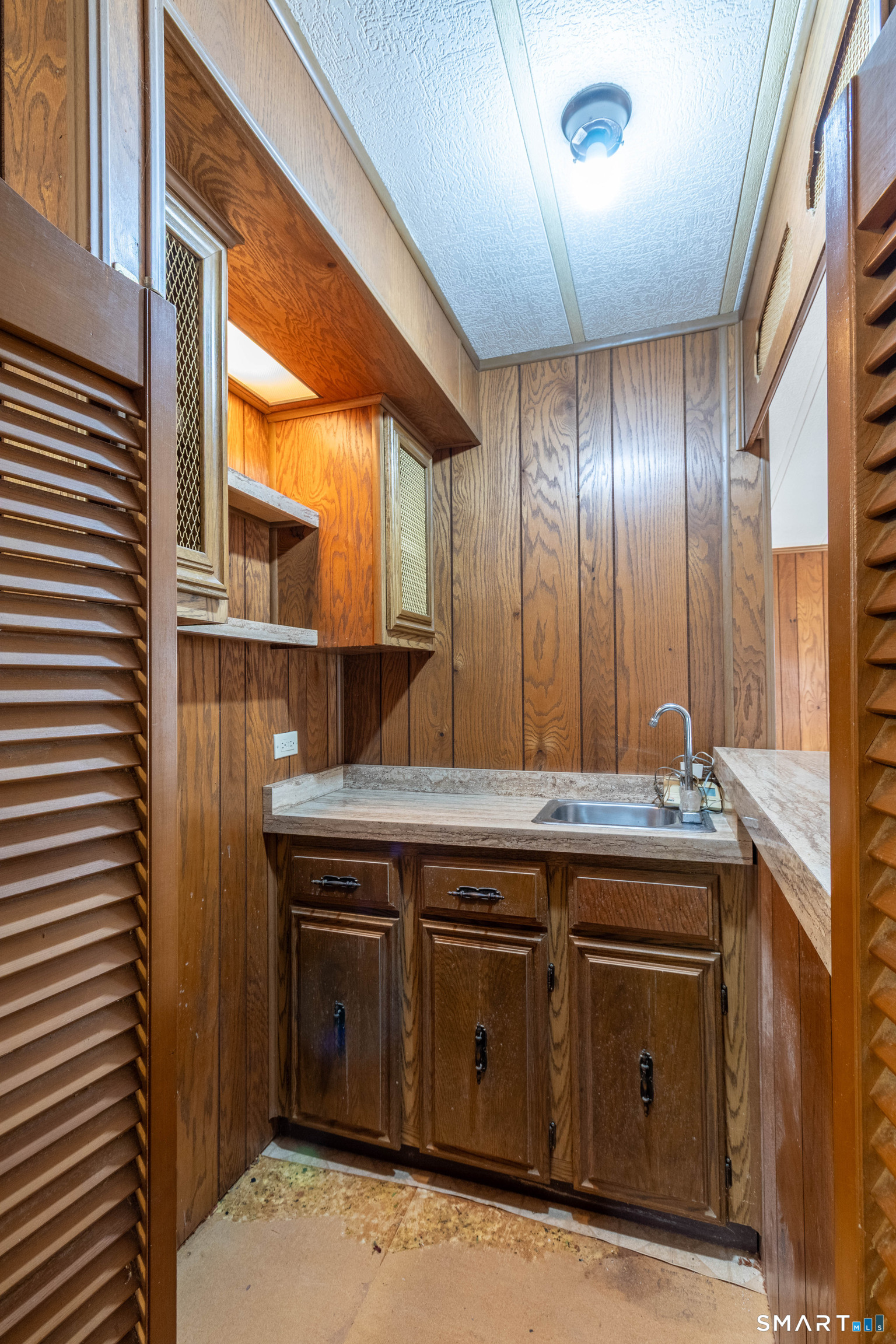 65 Colchester Cmns Colchester, CT 06415 - Photo 18 of 74 a view of a sink storage and utility room